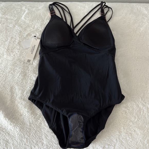 Amoressa Black and Bronze one Piece NWT Swimsuit.
Size 10. - Picture 9 of 9